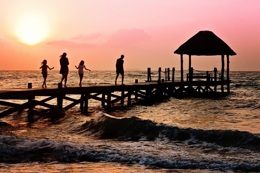 Family enjoying vacation at an all-inclusive resort, perfect for RCI members.