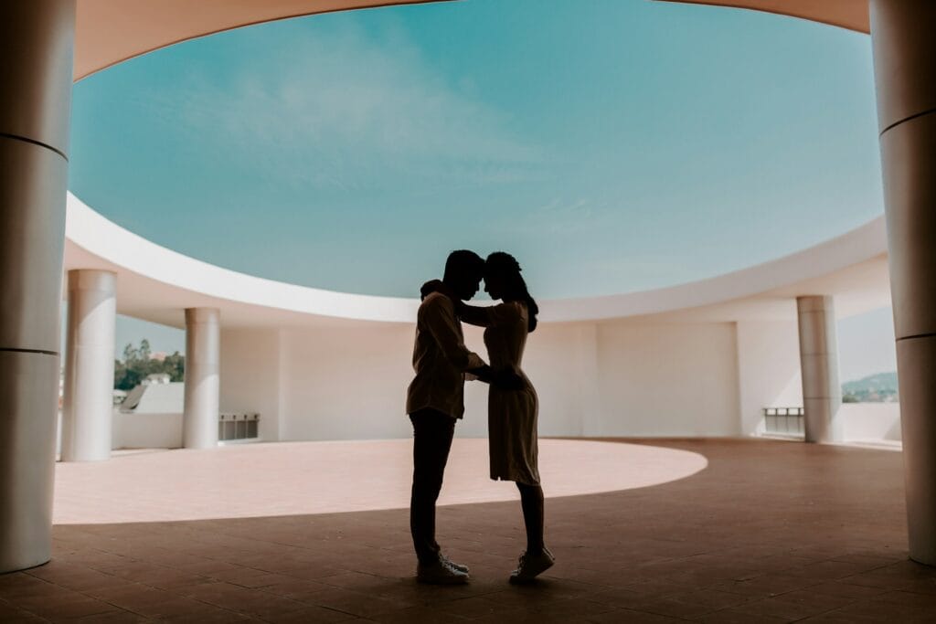 Couple enjoying a 5-star vacation at a luxury resort using RCI travel hacking strategies