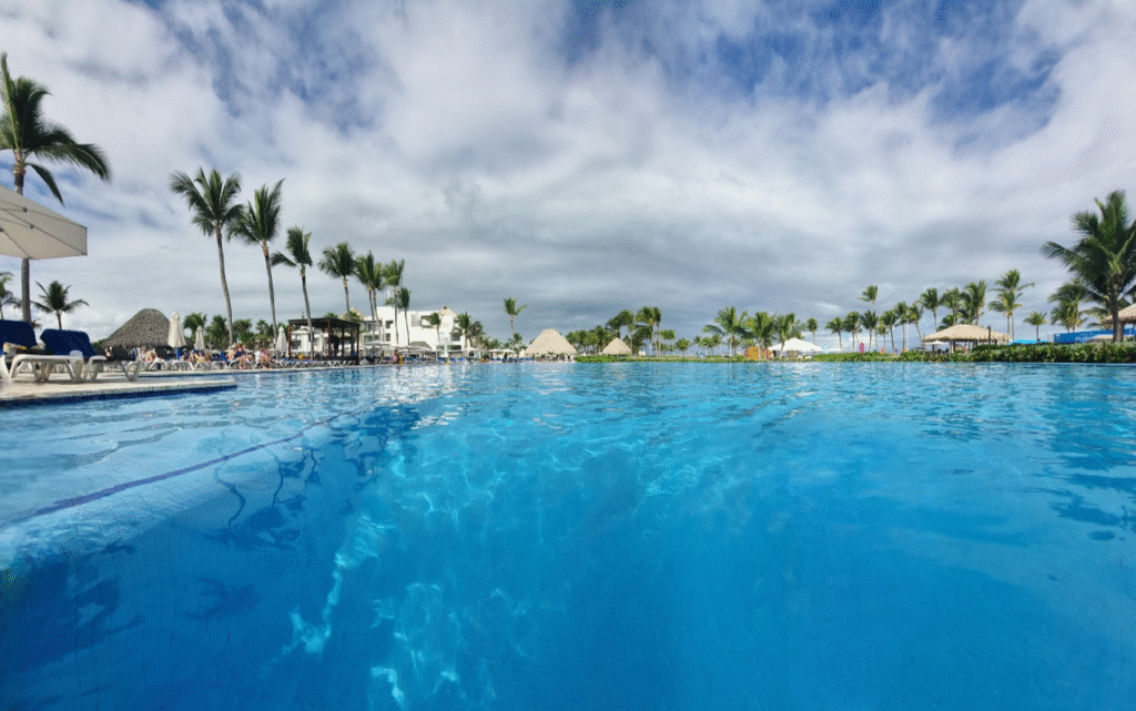 Hard Rock Punta Cana Family-friendly all-inclusive resort pool view at Hard Rock Punta Cana, showing spacious luxury amenities available with timeshare exchanges.
